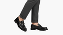 Black Loafers on Model - Light Grey Background