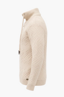 Beige kabeltrui zijkant