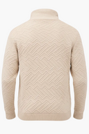 Beige kabeltrui achterkant