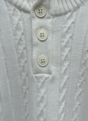 Witte Cable Knit Trui - Close-up Kabel en Knoopdetails