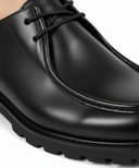 Zwarte Leren Schoenen - Close-up Leer en Stiksel
