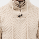 Kabeltrui detail diagonaal patroon en toggle sluiting