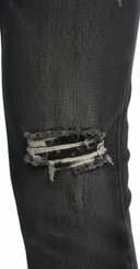 Zwarte Denim - Close-up Kniescheur en Wassing